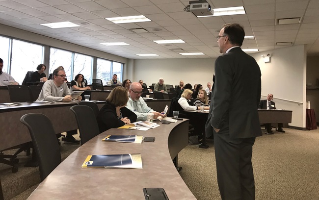 IMRF Executive Director Brian Collins shares updates at the 2018 Employer Rate Meeting in Naperville.